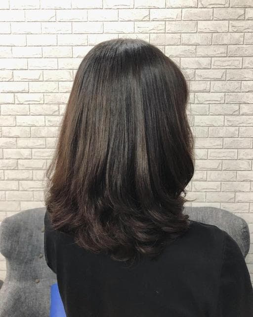 女生中長髮、燙卷、內彎