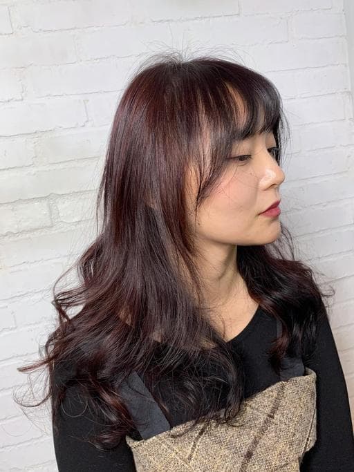 女生長髮、短瀏海、溫塑燙