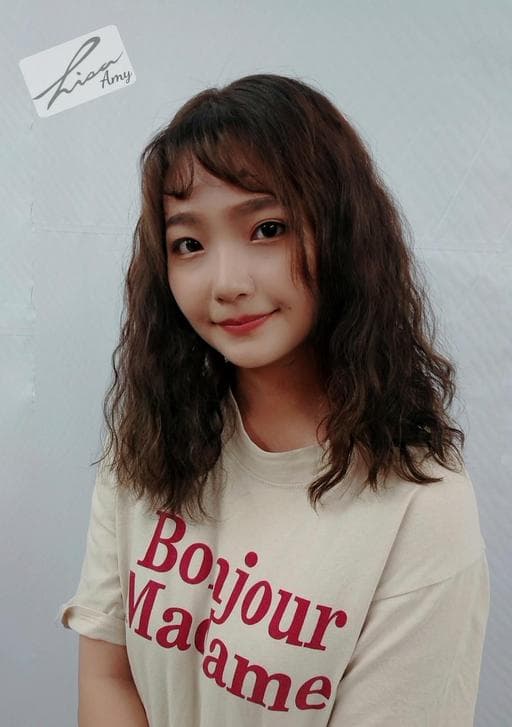 女生長髮、短瀏海、溫塑燙