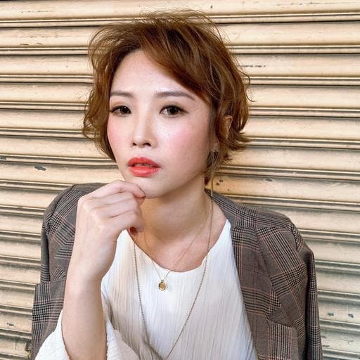 女生短髮、燙卷、長瀏海