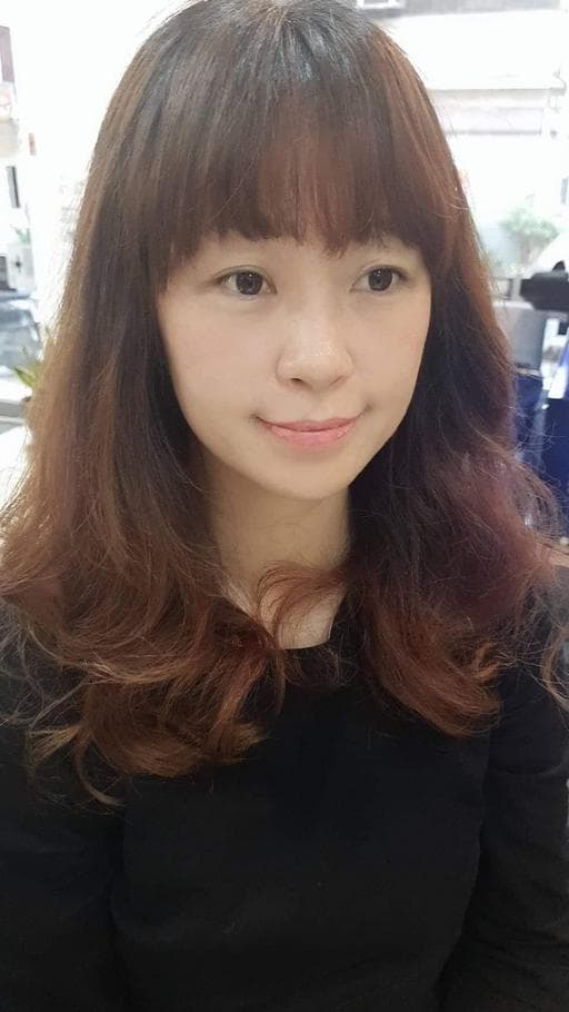 女生長髮、短瀏海、溫塑燙