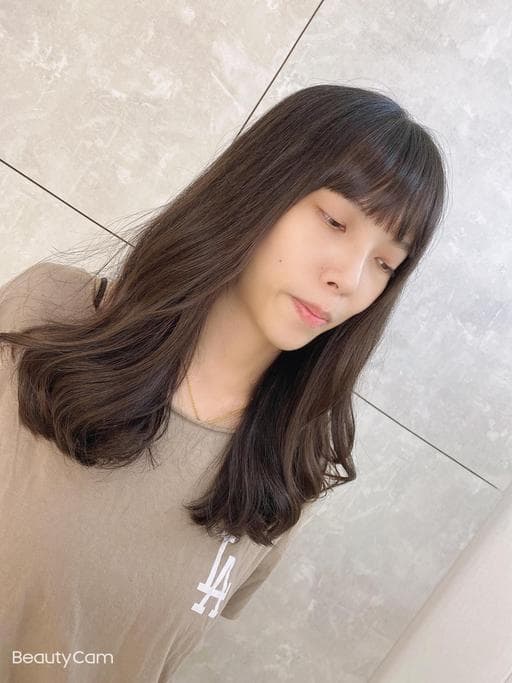 女生長髮、短瀏海、溫塑燙