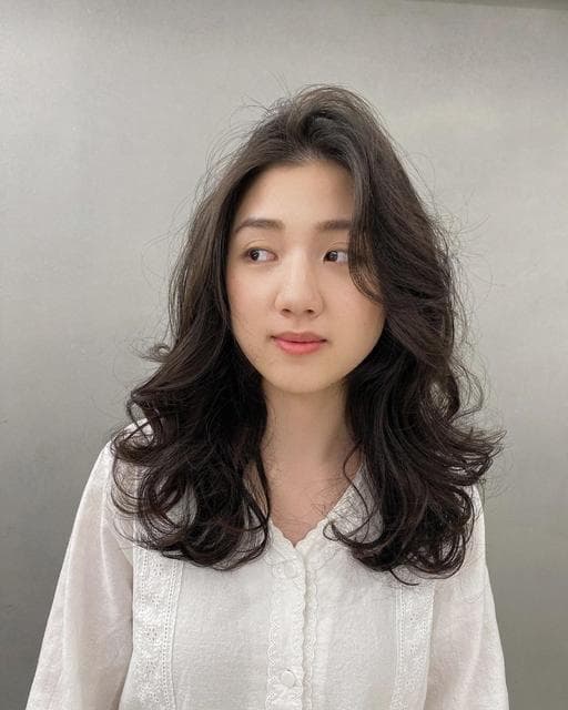 女生長髮、長瀏海、浪漫大卷