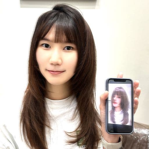 女生長髮、短瀏海、長臉